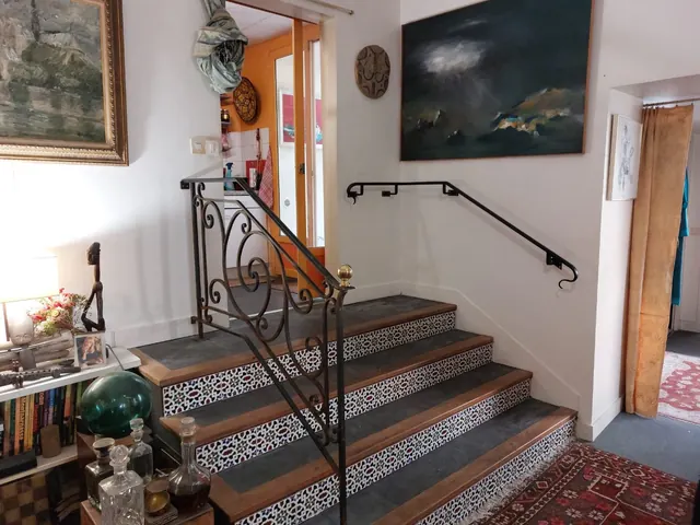 Rampe en fer forgé d'un escalier intérieur